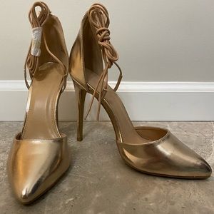 Shiny gold heels